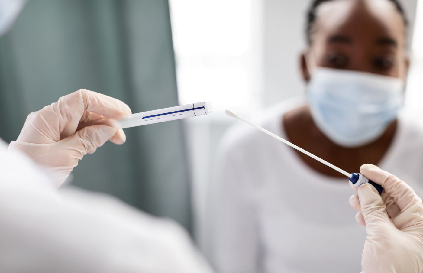 Doctor taking PCR test sample