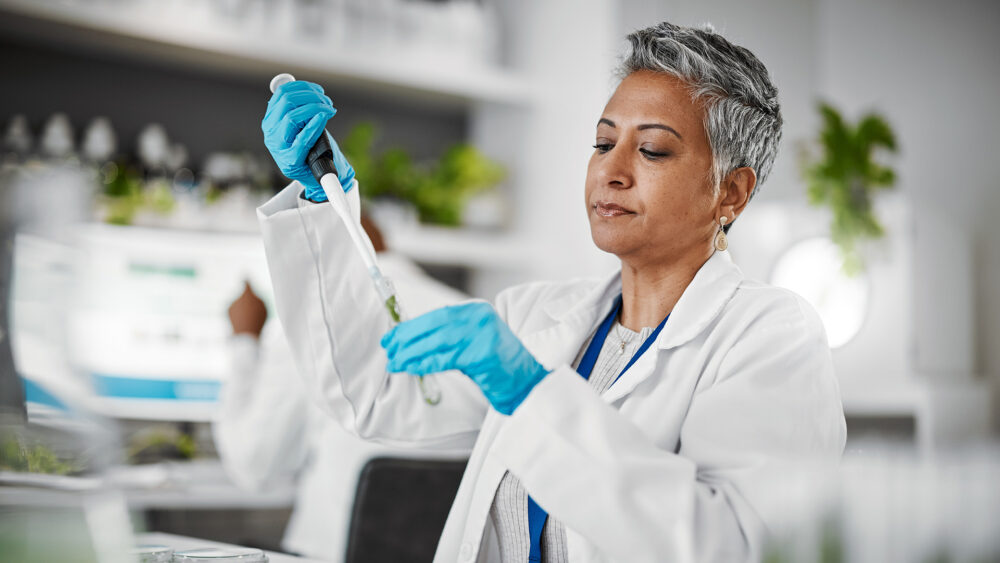 Laboratory scientist performing molecular diagnostic testing